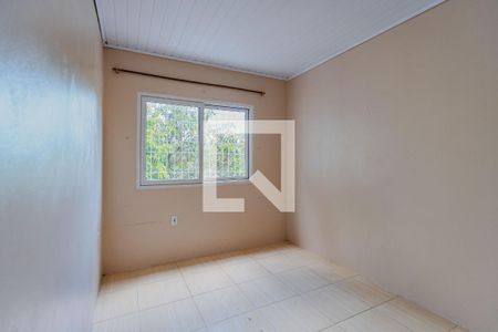 Quarto 1 de casa para alugar com 2 quartos, 70m² em Vila Nova, Porto Alegre