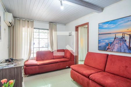 Sala de casa à venda com 3 quartos, 300m² em Vila Nova, Porto Alegre