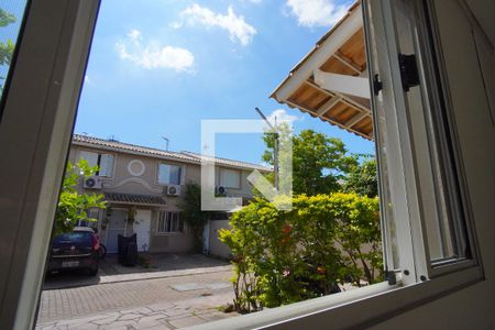 Sala - Vista de casa de condomínio à venda com 3 quartos, 87m² em Humaitá, Porto Alegre