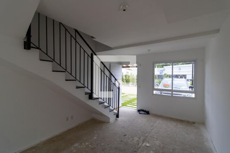 Sala de casa de condomínio para alugar com 2 quartos, 59m² em Vila Nova, Porto Alegre