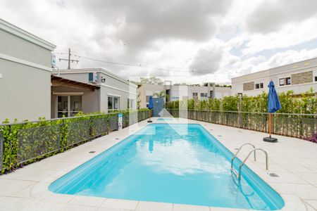 Área comum - Piscina de casa de condomínio para alugar com 2 quartos, 59m² em Vila Nova, Porto Alegre