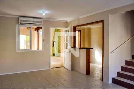 Sala de casa de condomínio à venda com 2 quartos, 200m² em Hípica, Porto Alegre