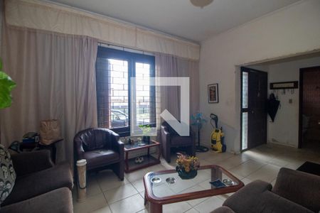 Sala de casa à venda com 3 quartos, 136m² em Guarujá, Porto Alegre