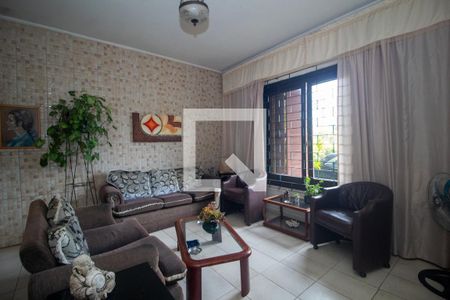 Sala de casa à venda com 3 quartos, 136m² em Guarujá, Porto Alegre