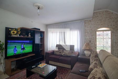 Sala de casa à venda com 3 quartos, 136m² em Guarujá, Porto Alegre