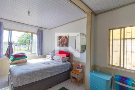 Quarto 1 de casa para alugar com 4 quartos, 550m² em Mathias Velho, Canoas