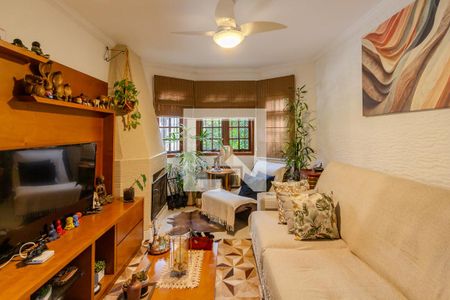 Sala de casa de condomínio à venda com 3 quartos, 258m² em Guarujá, Porto Alegre