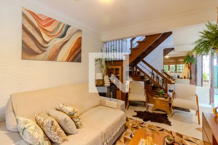 Sala de casa de condomínio à venda com 3 quartos, 258m² em Guarujá, Porto Alegre