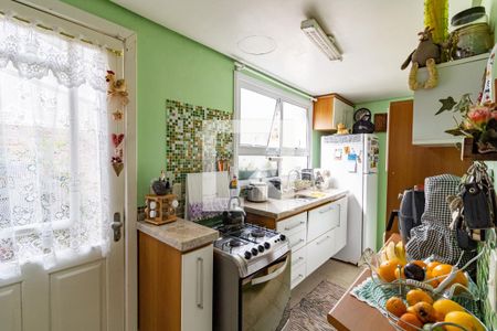 Cozinha de casa de condomínio à venda com 3 quartos, 175m² em Espírito Santo, Porto Alegre