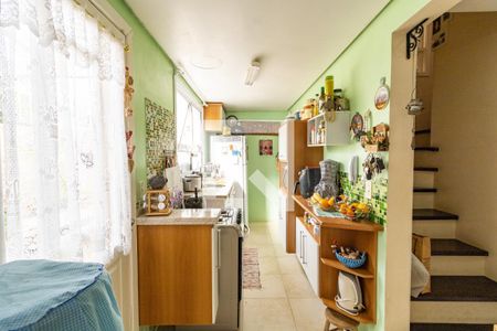 Cozinha de casa de condomínio à venda com 3 quartos, 175m² em Espírito Santo, Porto Alegre