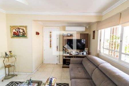 Sala de casa de condomínio à venda com 3 quartos, 175m² em Espírito Santo, Porto Alegre