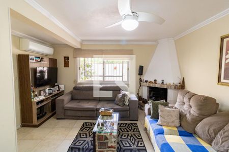 Sala de casa de condomínio à venda com 3 quartos, 175m² em Espírito Santo, Porto Alegre