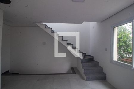 Sala de casa de condomínio à venda com 3 quartos, 120m² em Glória, Porto Alegre