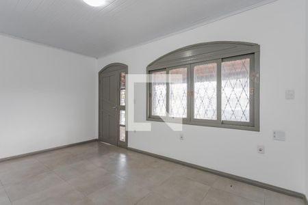 Sala de casa à venda com 3 quartos, 101m² em Santa Maria Goretti, Porto Alegre