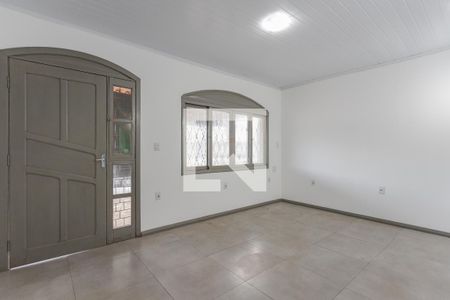 Sala de casa à venda com 3 quartos, 101m² em Santa Maria Goretti, Porto Alegre
