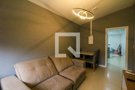 Sala de casa de condomínio à venda com 2 quartos, 72m² em Harmonia, Canoas