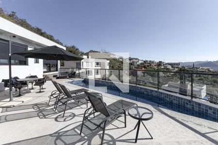 Sacada/Espaço Gourmet de casa de condomínio à venda com 4 quartos, 363m² em Jardim Serrano, Nova Lima