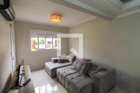 Sala de casa de condomínio à venda com 3 quartos, 120m² em Mato Grande, Canoas