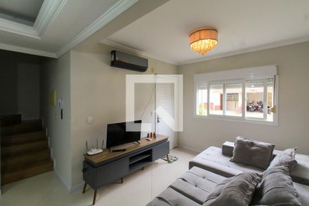 Sala de casa de condomínio à venda com 3 quartos, 120m² em Mato Grande, Canoas