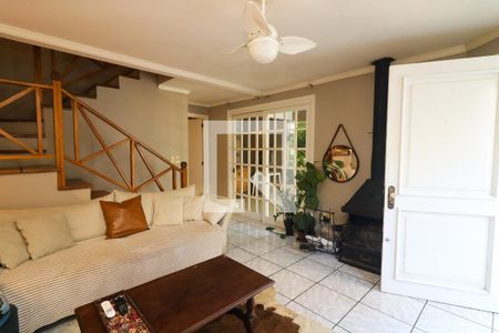 Sala de casa de condomínio à venda com 3 quartos, 238m² em Ipanema, Porto Alegre