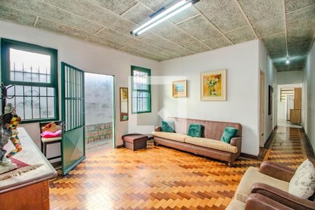 Sala de casa à venda com 2 quartos, 198m² em Auxiliadora, Porto Alegre