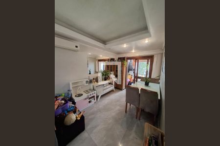 Sala de casa de condomínio à venda com 3 quartos, 150m² em Espírito Santo, Porto Alegre