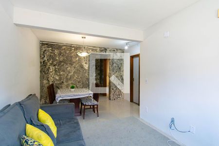 Sala de casa de condomínio à venda com 3 quartos, 100m² em Harmonia, Canoas