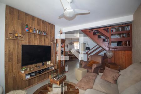 Sala de casa de condomínio à venda com 3 quartos, 180m² em Guarujá, Porto Alegre