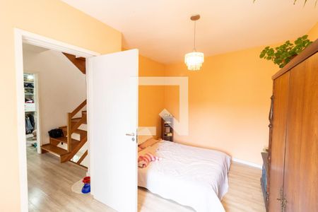 Suíte de casa de condomínio à venda com 4 quartos, 240m² em Vila Nova, Porto Alegre