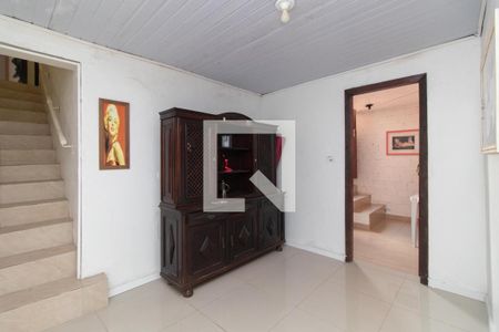 Sala de casa à venda com 4 quartos, 300m² em Vila Nova, Porto Alegre