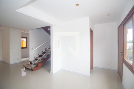 Sala de casa de condomínio à venda com 3 quartos, 99m² em Espírito Santo, Porto Alegre