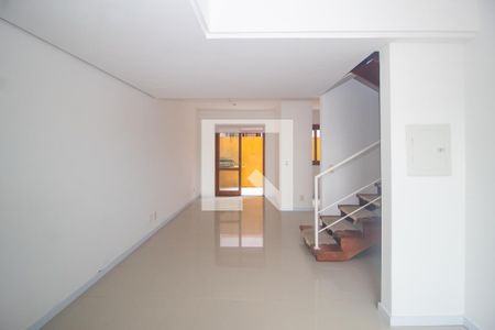 Sala de casa de condomínio à venda com 3 quartos, 99m² em Espírito Santo, Porto Alegre