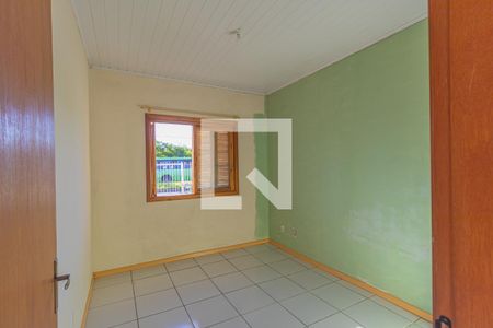 Quarto 1 de casa à venda com 2 quartos, 42m² em Guajuviras, Canoas