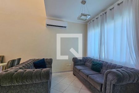 Sala de casa de condomínio para alugar com 3 quartos, 210m² em Bal Pernambuco, Guarujá