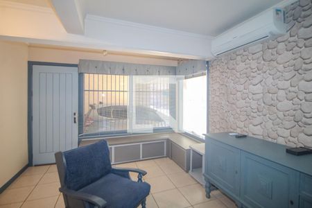 Sala de casa de condomínio para alugar com 4 quartos, 196m² em Vila Assunção, Porto Alegre