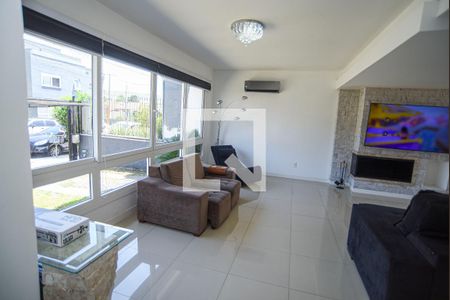 Sala de casa de condomínio para alugar com 3 quartos, 181m² em Mário Quintana, Viamão