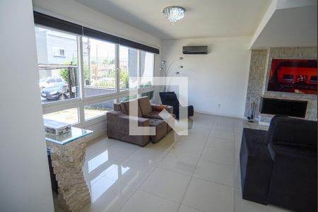 Sala de casa de condomínio para alugar com 3 quartos, 181m² em Mário Quintana, Viamão