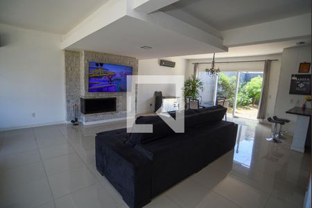 Sala de casa de condomínio para alugar com 3 quartos, 181m² em Mário Quintana, Viamão