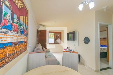 Sala de casa de condomínio à venda com 2 quartos, 42m² em Harmonia, Canoas