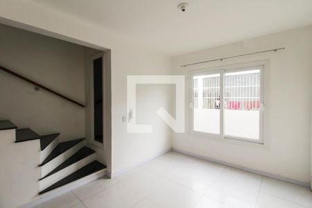 Sala de casa de condomínio à venda com 2 quartos, 89m² em Centro, Canoas