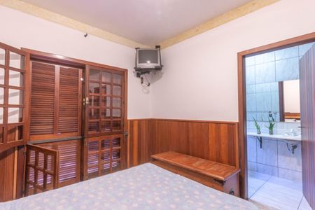 Casa de condomínio à venda com 595m², 4 quartos e 6 vagas Casa de condomínio à venda com 595m², 4 quartos e 6 vagasSuíte 3