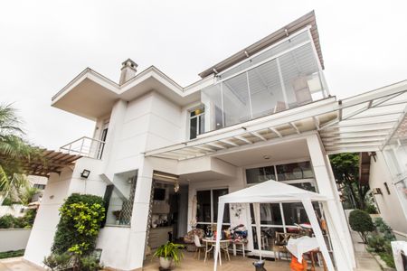 Casa de condomínio para alugar com 420m², 1 quarto e 4 vagas Casa de condomínio para alugar com 420m², 1 quarto e 4 vagasFachada