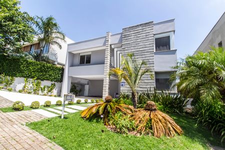 Casa de condomínio à venda com 464m², 4 quartos e 4 vagas Casa de condomínio à venda com 464m², 4 quartos e 4 vagasVista da Rua