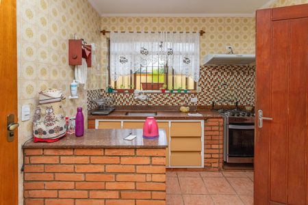 Casa à venda com 133m², 3 quartos e 2 vagas Casa à venda com 133m², 3 quartos e 2 vagasCozinha