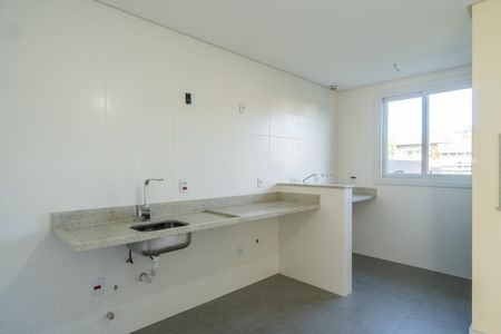 Casa de condomínio à venda com 154m², 3 quartos e 3 vagas Casa de condomínio à venda com 154m², 3 quartos e 3 vagasCozinha e Área de Serviço