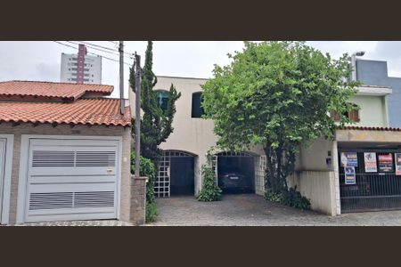 Casa à venda com 280m², 4 quartos e 2 vagas Casa à venda com 280m², 4 quartos e 2 vagasFachada