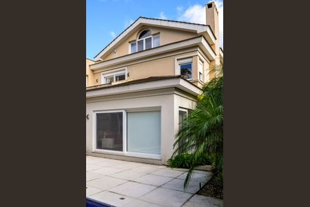 Casa de condomínio à venda com 458m², 5 quartos e 4 vagas Casa de condomínio à venda com 458m², 5 quartos e 4 vagasVista da Fachada