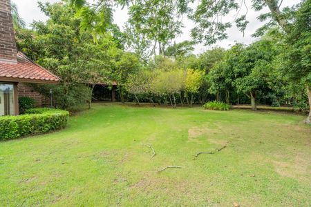 Casa de condomínio para alugar com 590m², 5 quartos e 5 vagas Casa de condomínio para alugar com 590m², 5 quartos e 5 vagasQuintal