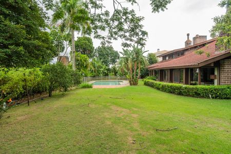 Casa de condomínio para alugar com 590m², 5 quartos e 5 vagas Casa de condomínio para alugar com 590m², 5 quartos e 5 vagasQuintal