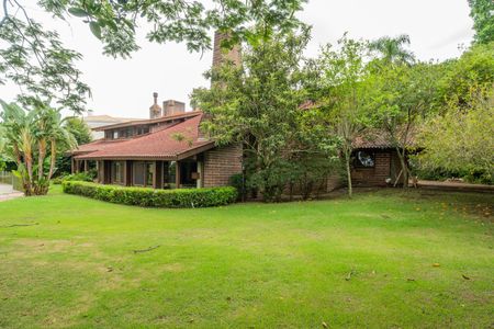 Casa de condomínio para alugar com 590m², 5 quartos e 5 vagas Casa de condomínio para alugar com 590m², 5 quartos e 5 vagasQuintal